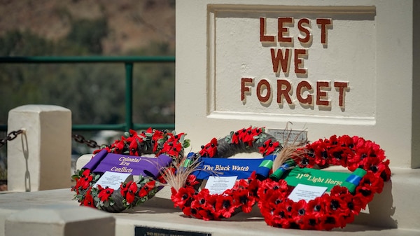 Three wreath laid at a memorial