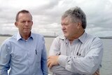 (LtoR) Opposition Leader Tony Abbott talks to Member for Flynn Ken O'Dowd in Gladstone.