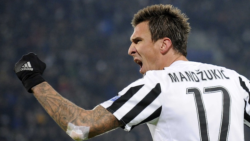 Mario Mandzukic celebrates after scoring for Juventus