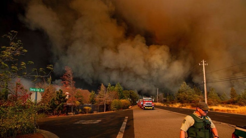 Residents in California flee the raging wildfires
