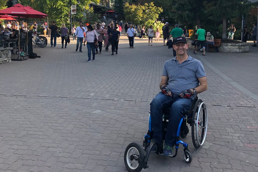Man in wheelchair at Whistler.