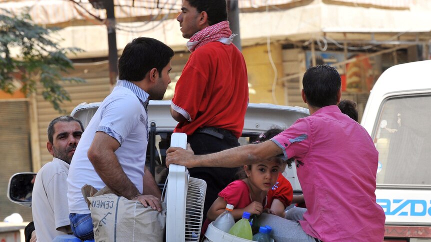 Syrians leave Aleppo CBD