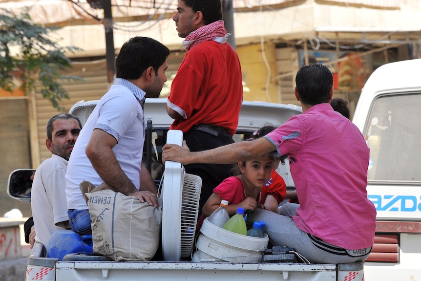 Syrians leave Aleppo CBD