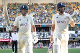 Two English batters leave the Gabba at stumps on day three of the first men's Ashes Test.