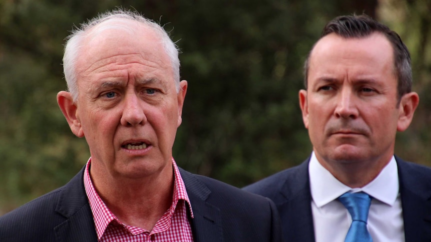 Headshot of Emergency Services Minister Fran Logan, with WA Premier Mark McGowan behind.