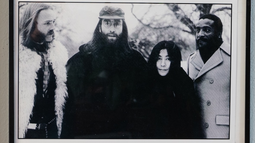 A historic photo of Ritchie Yorke with John Lennon, Yoko Ono and civil rights activist Dick Gregory. 