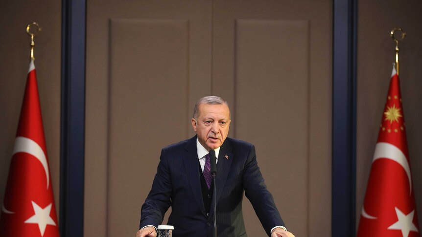 Turkish president Recep Tayyip Erdogan speaks before NATO