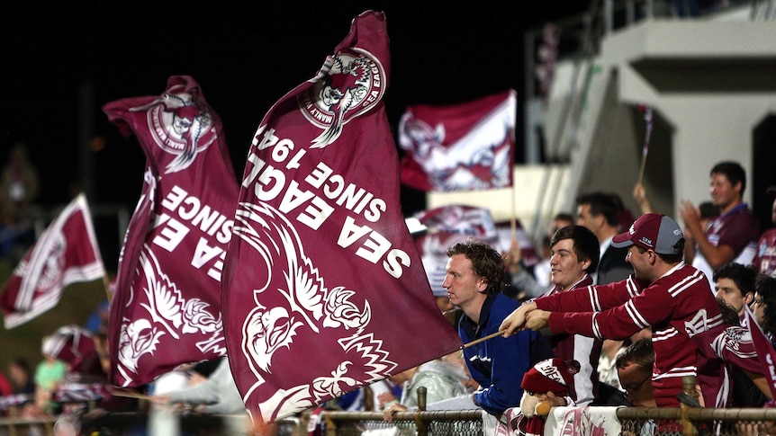 Manly fans support their team in round three, 2015 match against the Bulldogs at Brookvale Oval.