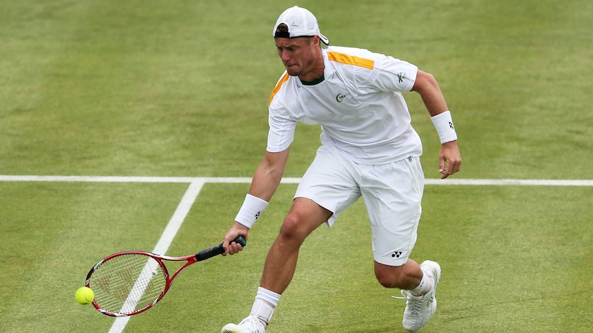 Australia's Lleyton Hewitt plays a forehand during his win over Bulgaria's Grigor Dimitrov.