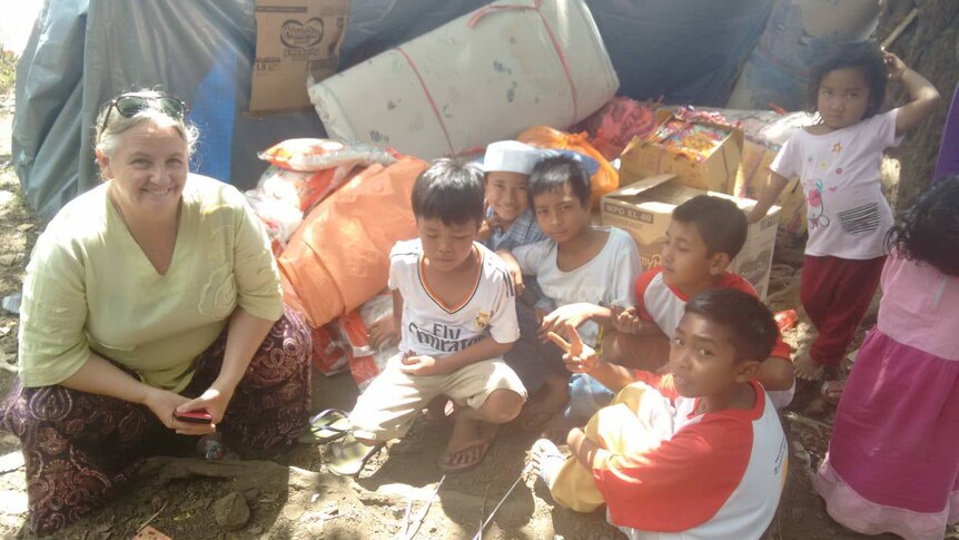Jodie Epper with a group of children on Lombok, August, 2018