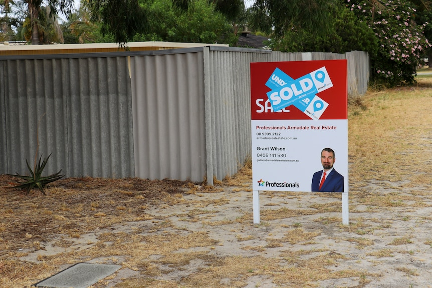 A sold sticker on a for sale sign outside an Armadale property.