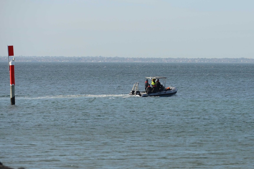 Search teams scoured the water off Altona