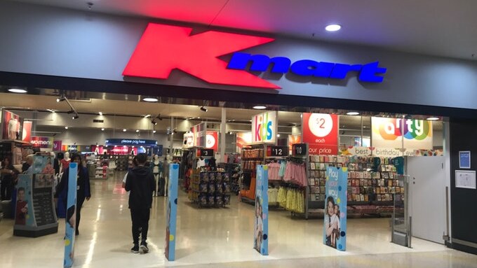 the entrance to a kmart store
