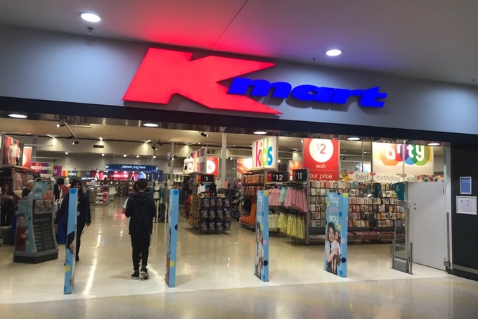 the entrance to a kmart store