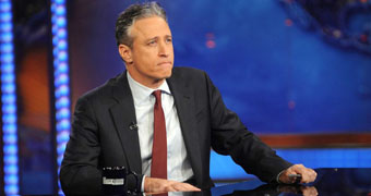 Jon Stewart at The Daily Show desk