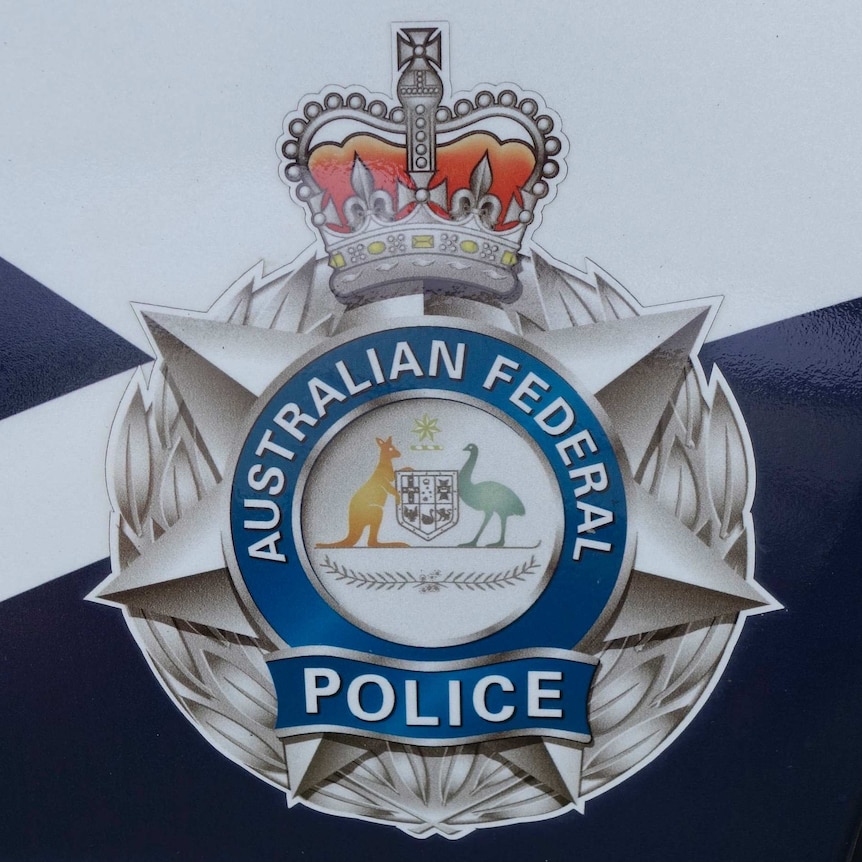 Close up of the Australian Federal Police logo.