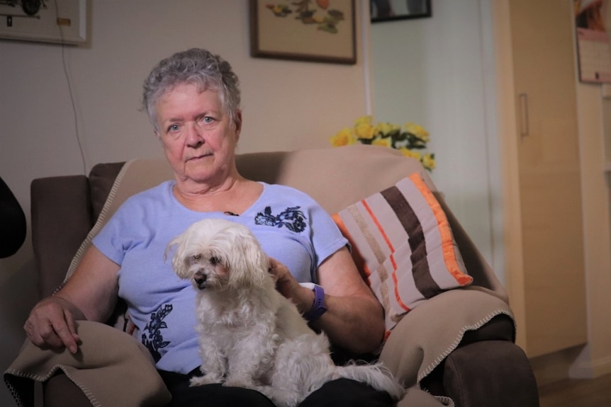Pensioner Jennifer Andrews with her dog.