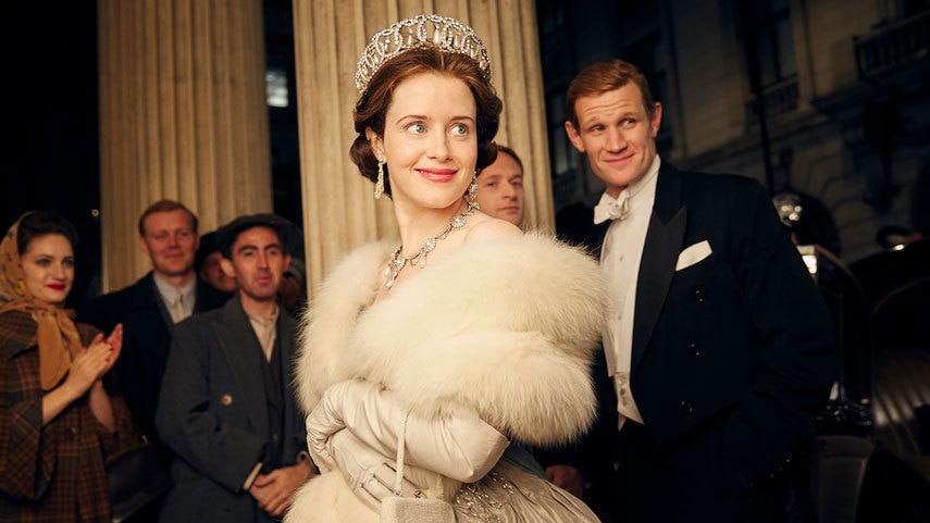 Claire Foy wears a diamond tiara and white fur coat in the show The Crown.