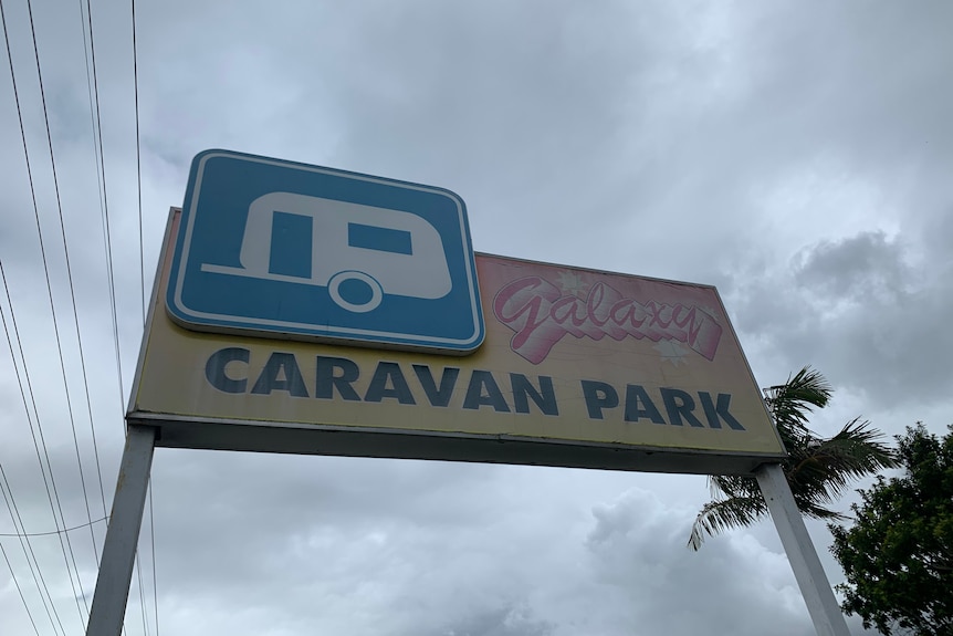 A sign for the galaxy caravan park.
