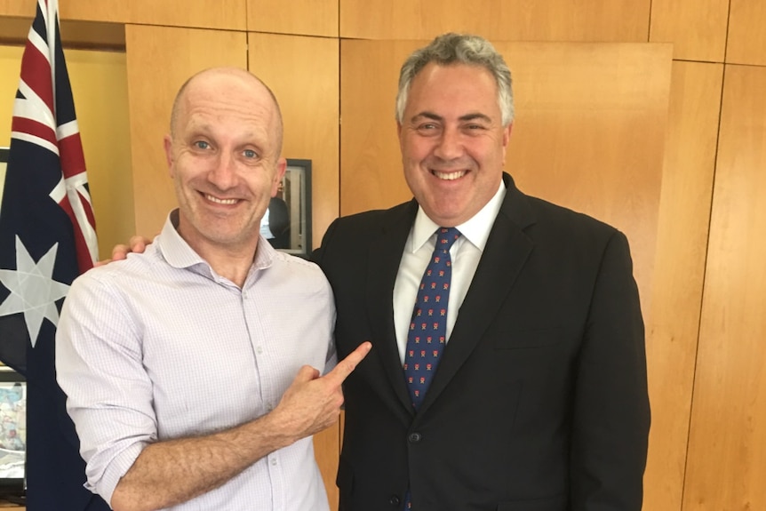 ABC presenter Rafael Epstein poses for a photo with Australia's ambassador to the United States, Joe Hockey.