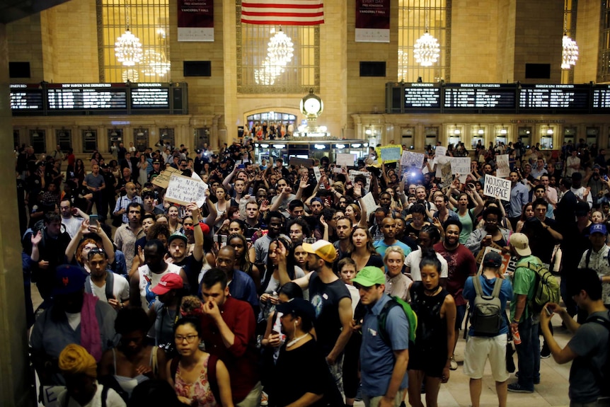 People protest in Grand Central Station