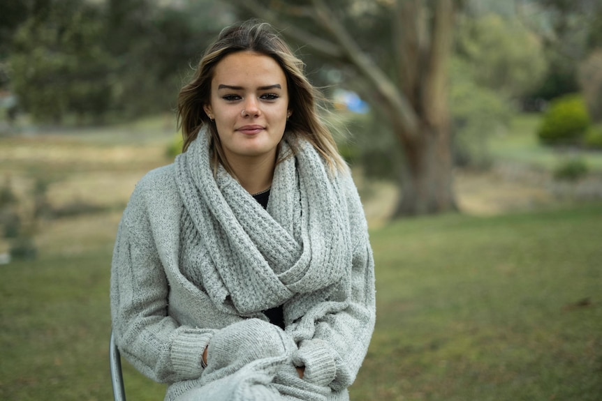 A young woman in a park.