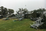 A tent city set up to house evacuees from Cyclone Trevor has been battered by torrential rain in Darwin.
