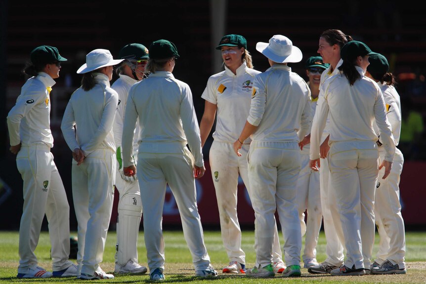 Ellyse Perry speaks to her Australia teammates during the Women's Ashes Test.