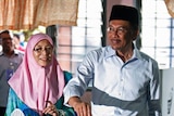 Malaysia's opposition leader Anwar Ibrahim and his wife Wan Azizah Wan Ismail during general electio