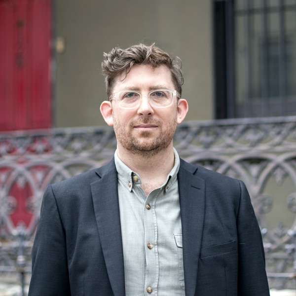 Close up of man wearing shirt and jacket