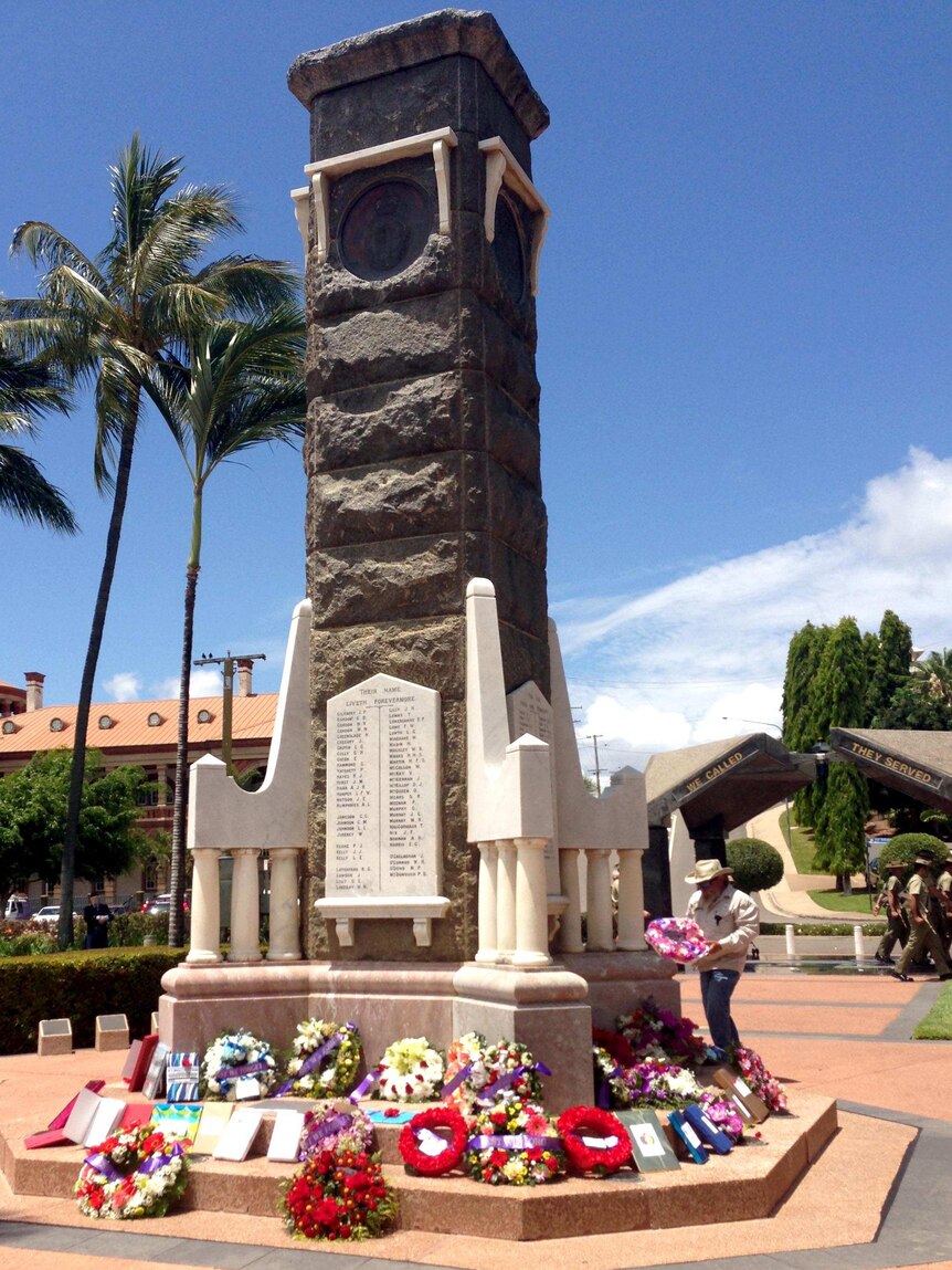 Wreaths lie at the foot of the Cenotaph in Townsville during the Remembrance Day Service.
