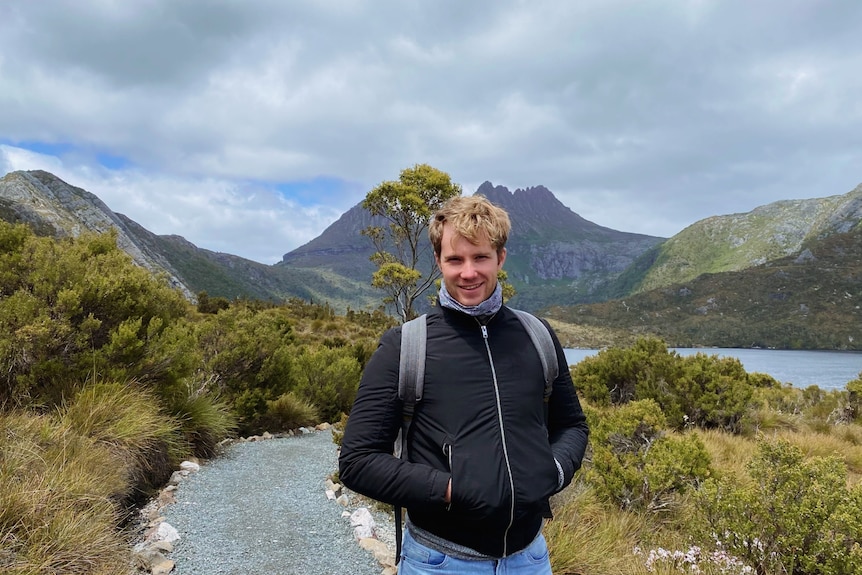 A man in hiking gear outdoors in Tasmania