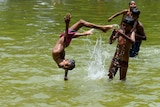 Indian children cool down during heatwave