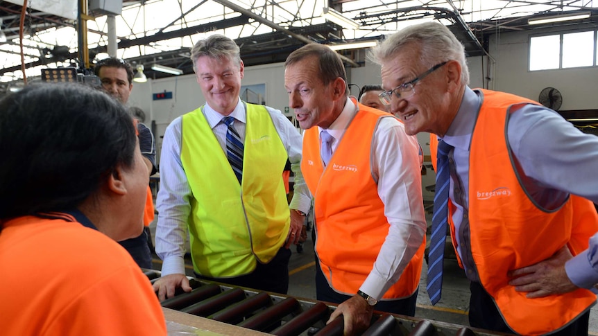 Tony Abbott and LNP candidate for Griffith Bill Glasson during a visit to the Breezway factory in Brisbane.