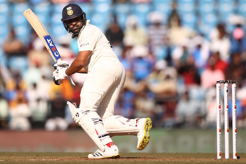 An Indian male batter plays a shot to the leg side during a Test against Australia.