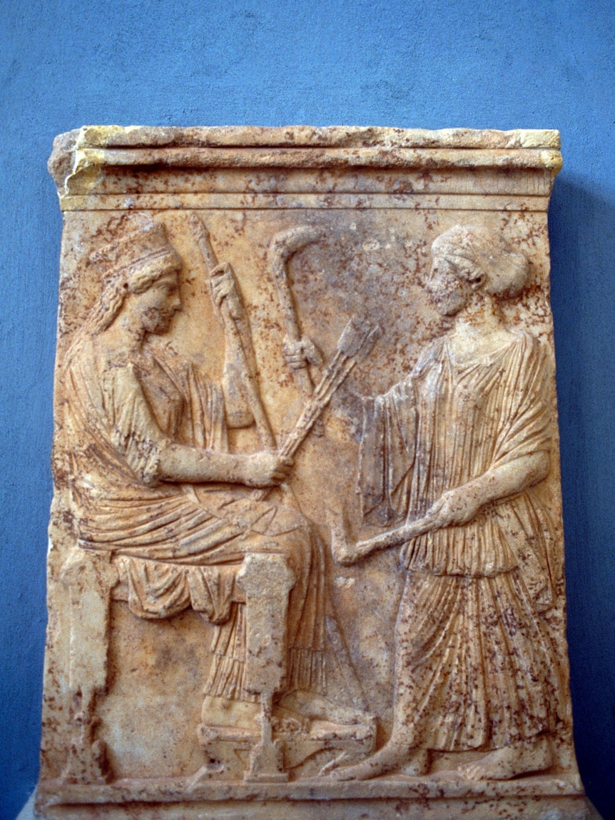 An ancient votive plaque showing Demeter and Persephone