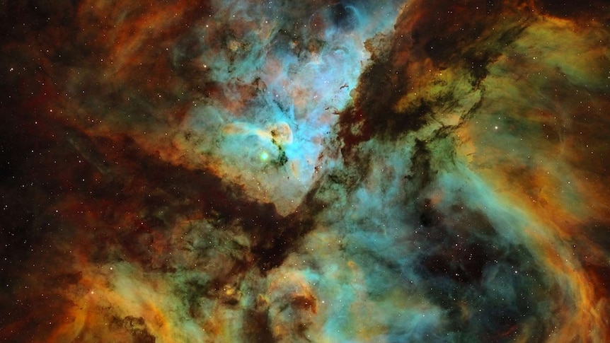 Cloudy cluster of stars in rainbow of colours