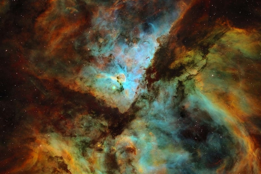 Cloudy cluster of stars in rainbow of colours
