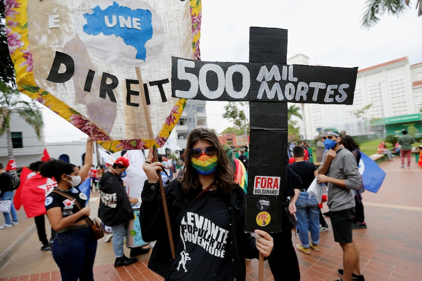 people protesting with banners