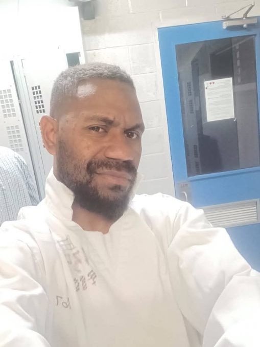 A man in a white shirt