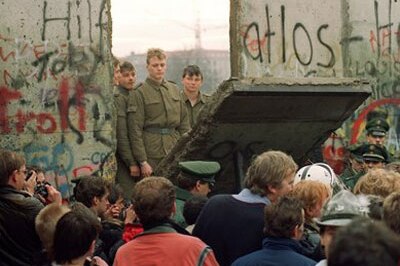 People from East Germany greet citizens of West Germany at the Brandenburg Gate in Berlin in 1989