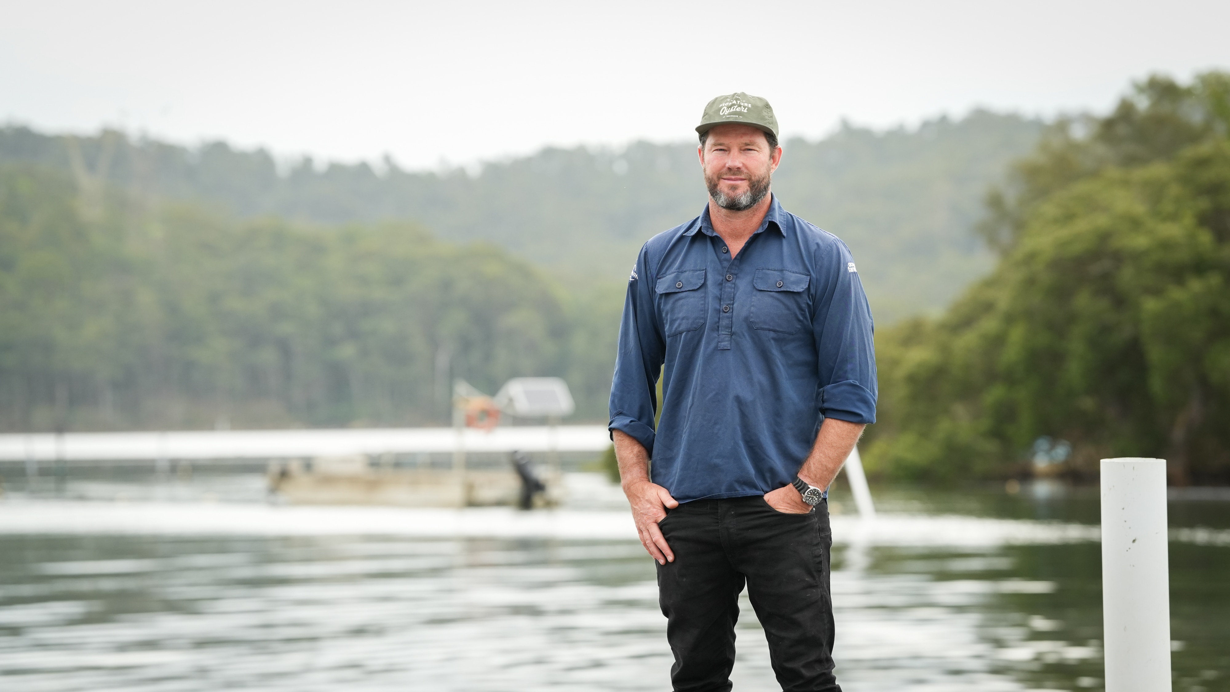 Man standing on a wharf.