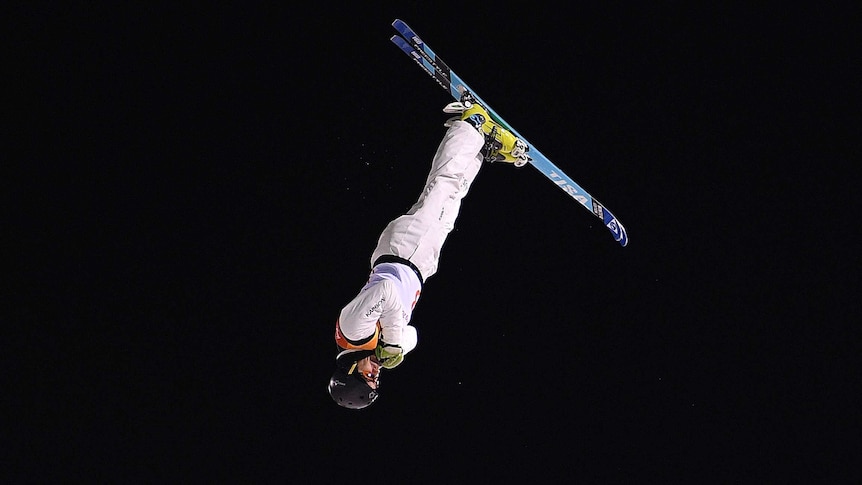 David Morris in mid-air as he performs his jump in the men's aerials final at the Olympic Winter Games.