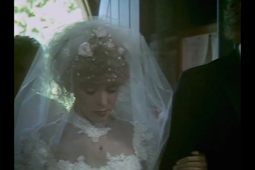 Kylie Minogue in the wedding scene from Neighbours.