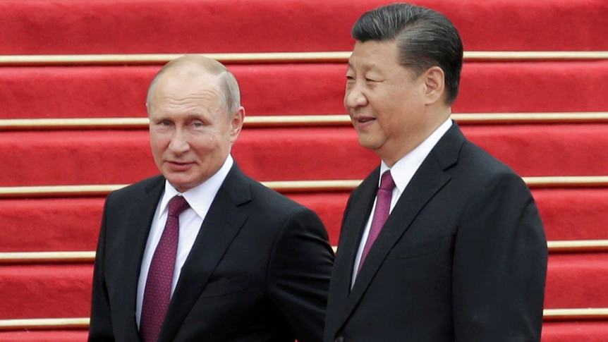 中国国家主席习近平和俄罗斯总统弗拉基米尔·普京的关系令人担忧到西方。” class=