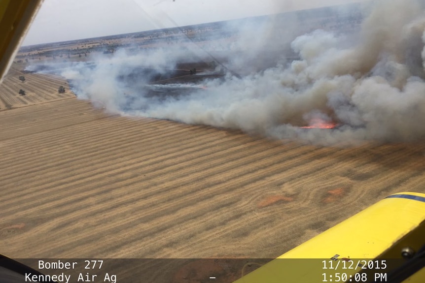 Fire burning in cropping land near Collingullie in NSW on Friday December 11, 2015.