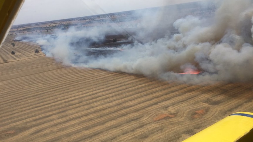 Fire burning in cropping land near Collingullie in NSW on Friday December 11, 2015.