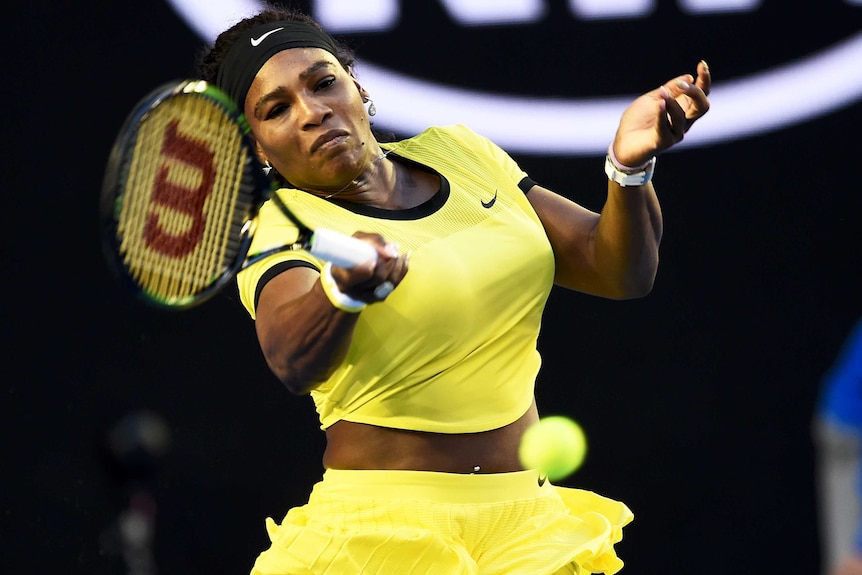 Gritty encounter ... Serena Williams plays a forehand against Angelique Kerber during the women's final