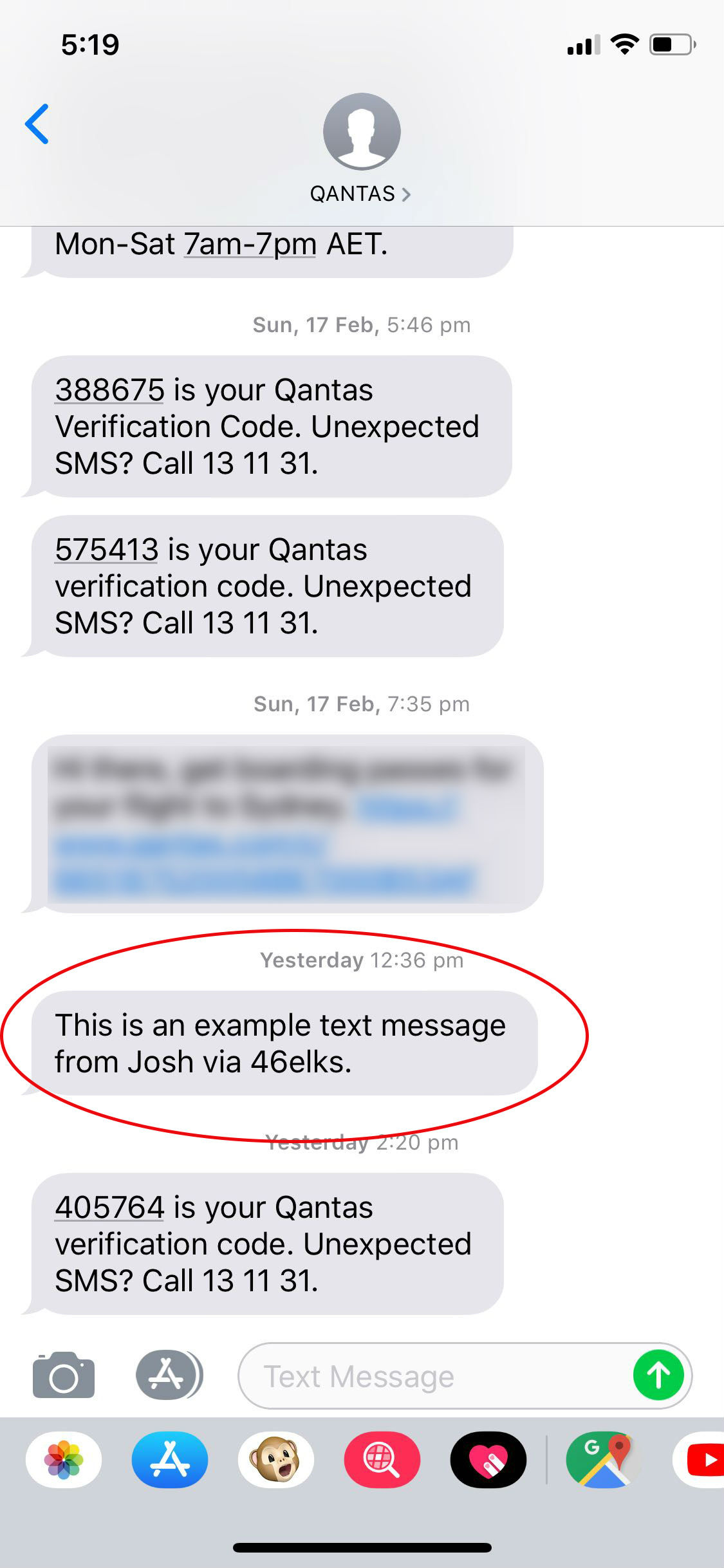 A text message thread from QANTAS, including a fake message.