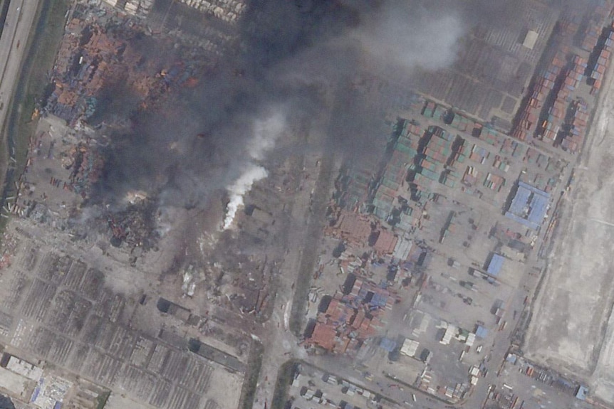 A satellite image shows damage from two massive blasts that ripped through an industrial area of the Chinese port city of Tianjin.